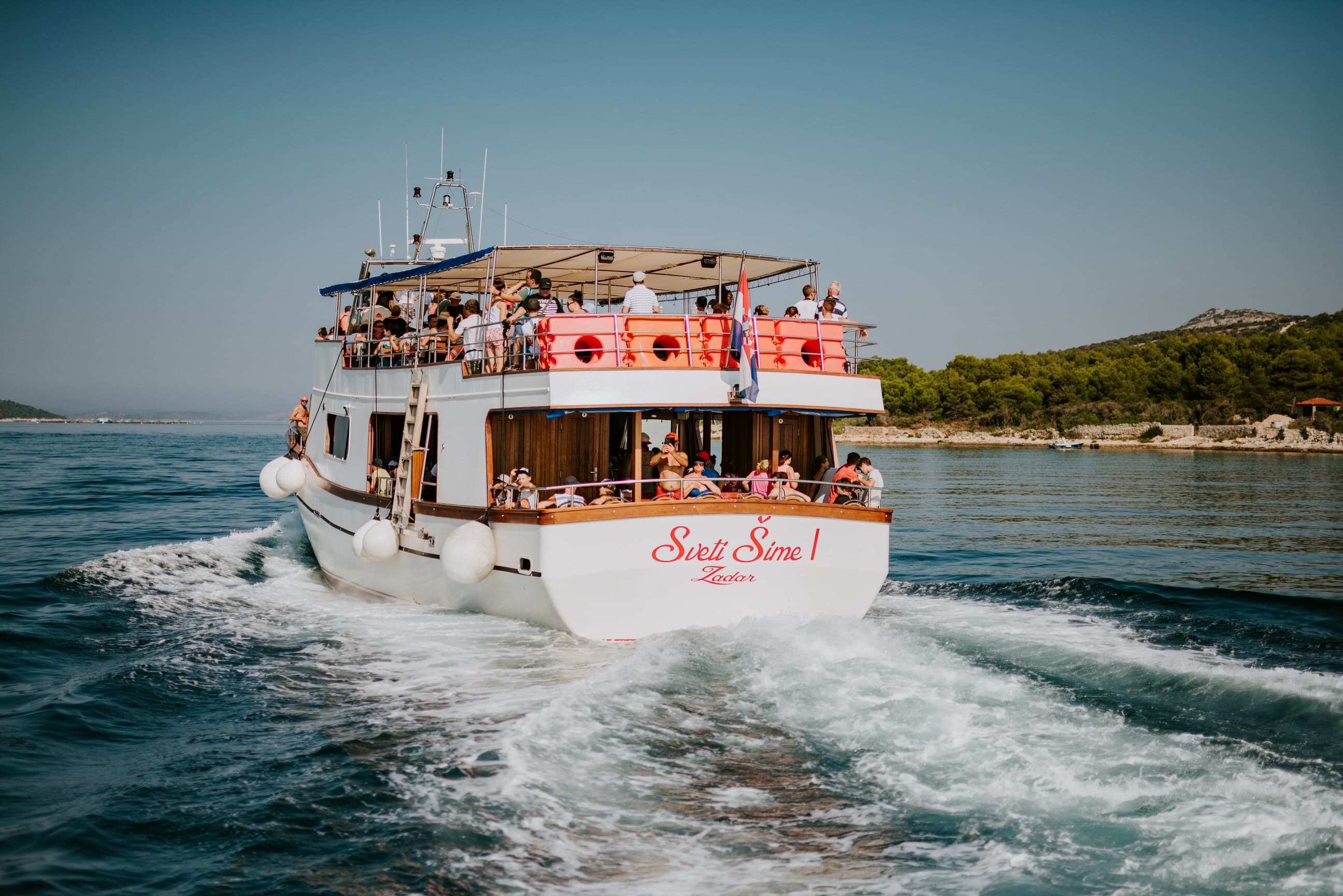 Tourists swimming in Salt Lake Mir